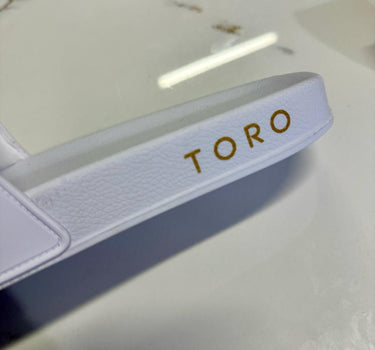Chinelo Toro Slide White Gold Edition